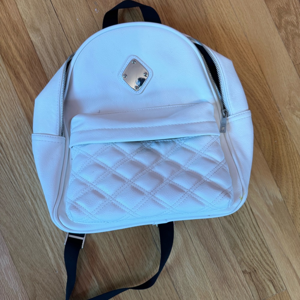 mini white backpack from claire’s